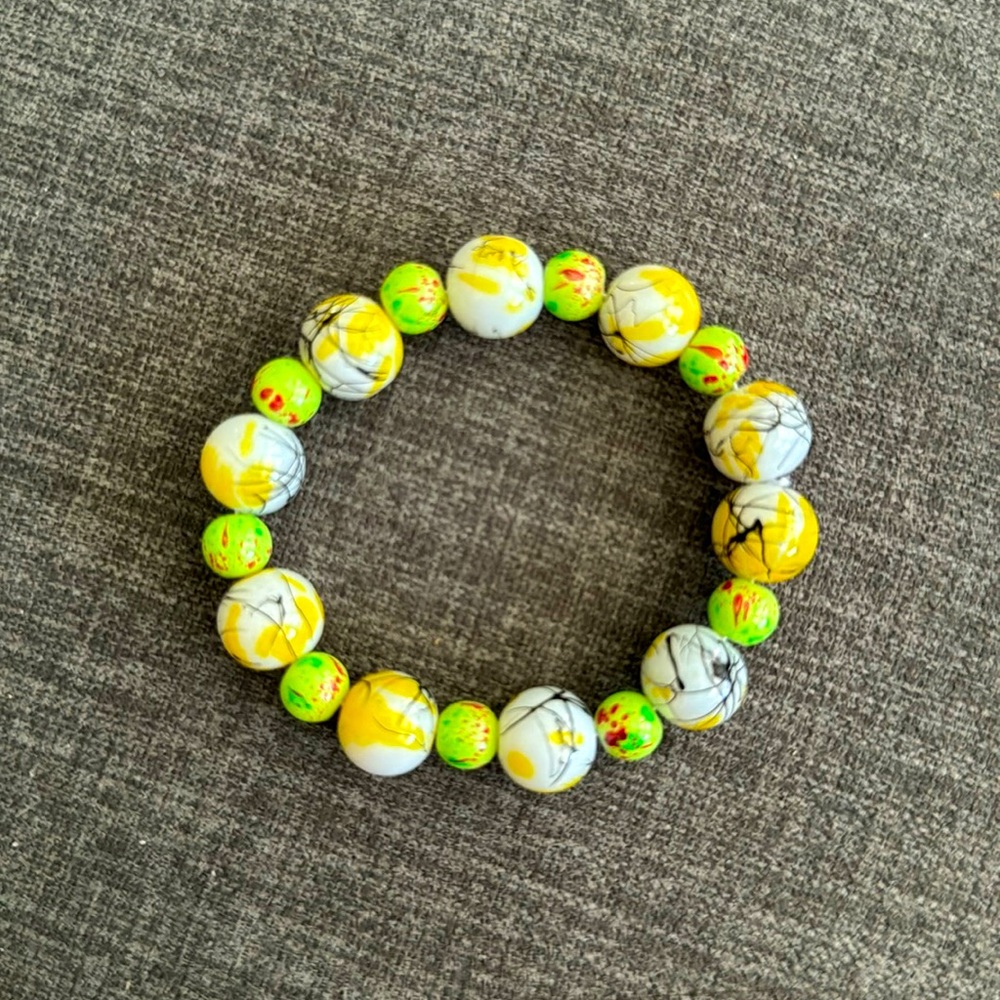 Handmade bracelet with yellow/green glass beads
